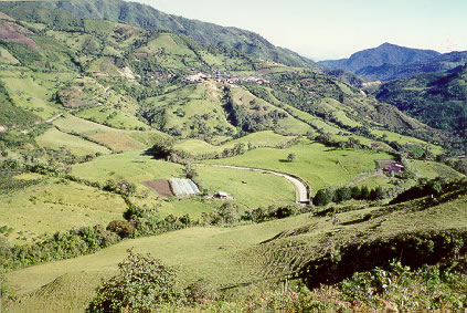 View of town of La Merced de Buenos Aires in distance, located on the western slopes of Cordillera Negra in northwestern Imbabura Province.